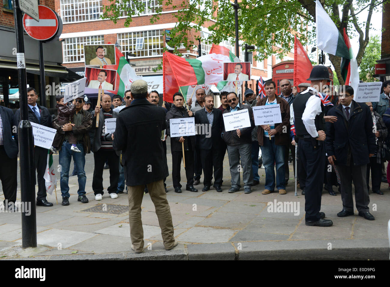 London England, 9th May 2014 : Party of MQM UK and supporters protest against Amnesty International Negative Propaganda against MQM. Undermind and damages with pack of lies toward MQM party in Pakistan in London. Credit:  See Li/Alamy Live News Stock Photo