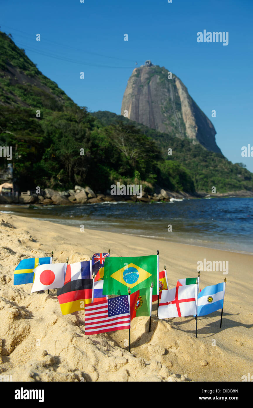 International flags on Praia Vermelha Red Beach at Sugarloaf Mountain Rio de Janeiro Brazil Stock Photo