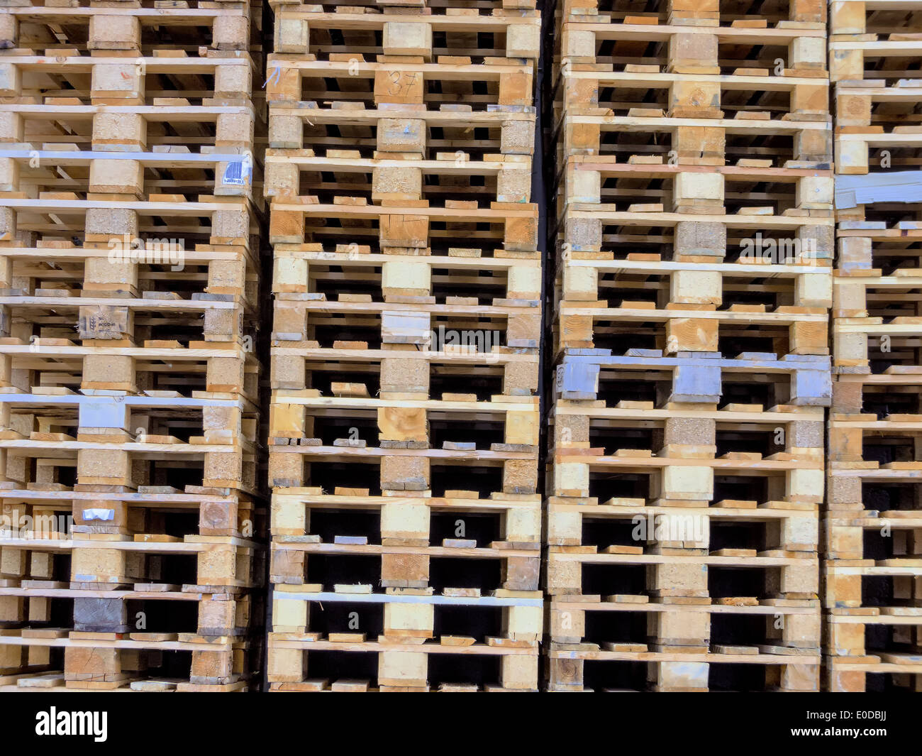 Stacked transport palettes, symbolic photo for goods traffic and logistics, Gestapelte Transportpaletten, Symbolfoto fuer Gueter Stock Photo