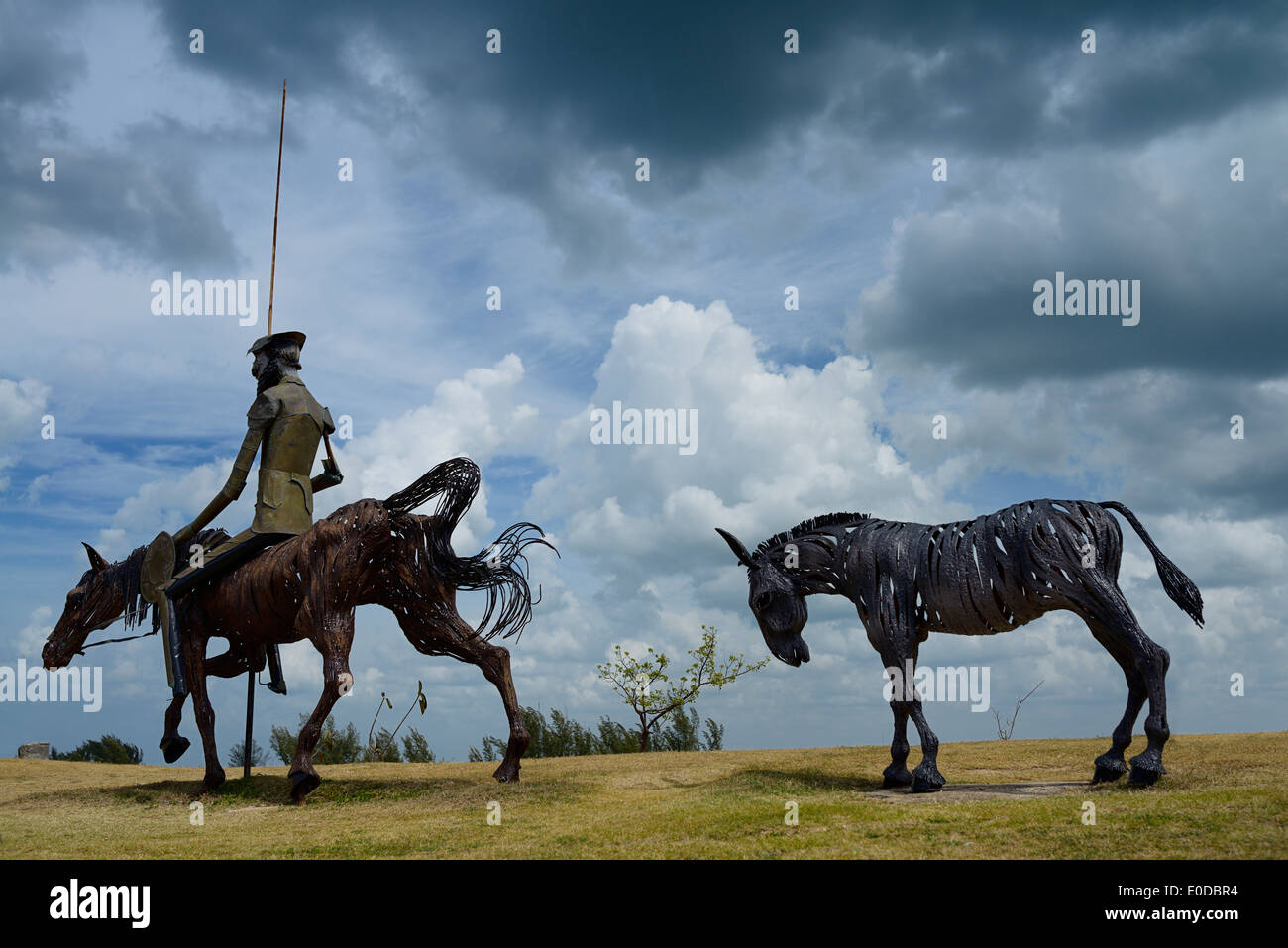 Steel sculpture of Don Quixote with lance and shield on horseback with pony in Varadero Cuba Stock Photo