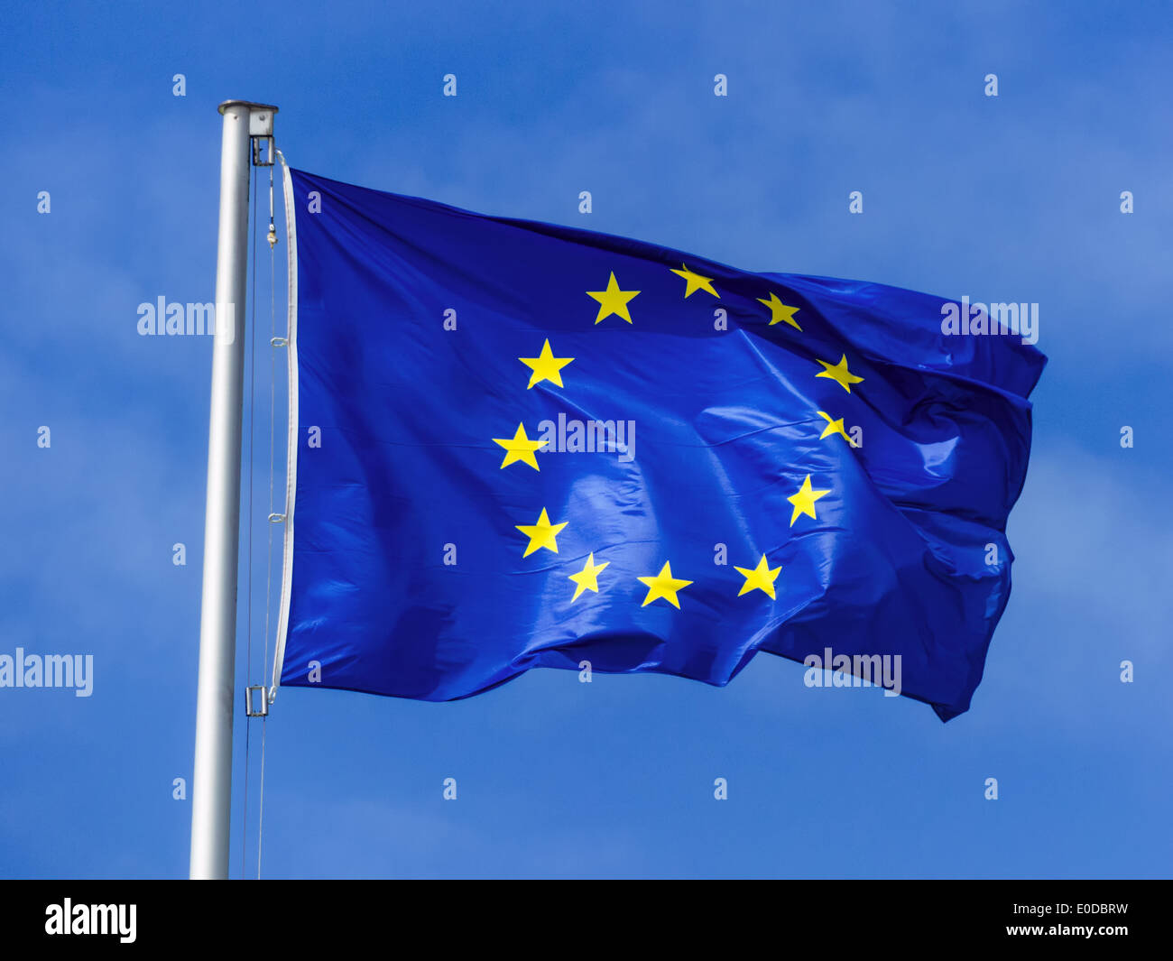 The flag of the European Union blows in the wind. EU flag, Die Flagge der Europaeischen Union weht im Wind. EU-Fahne Stock Photo
