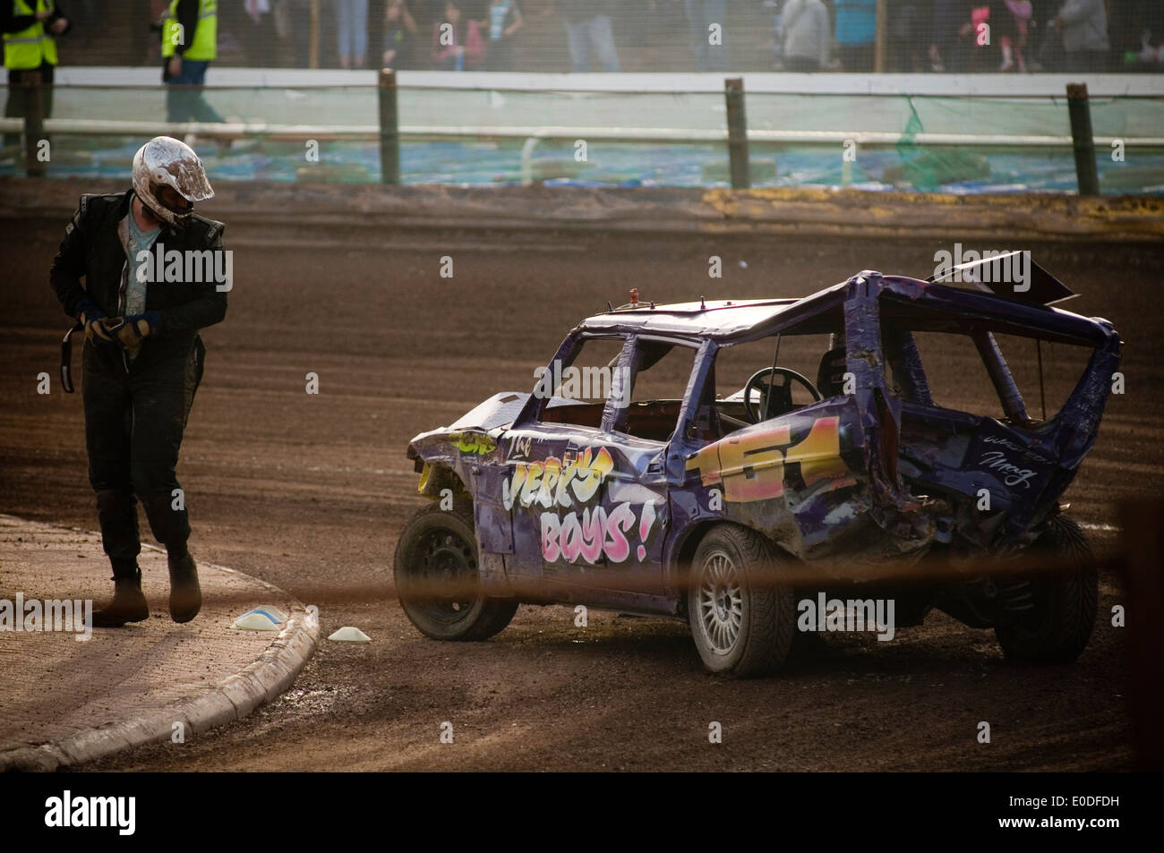 banger racing race races demolition derby derbies destruction old car cars smashed smash up smashing volvo estate driver drivers Stock Photo