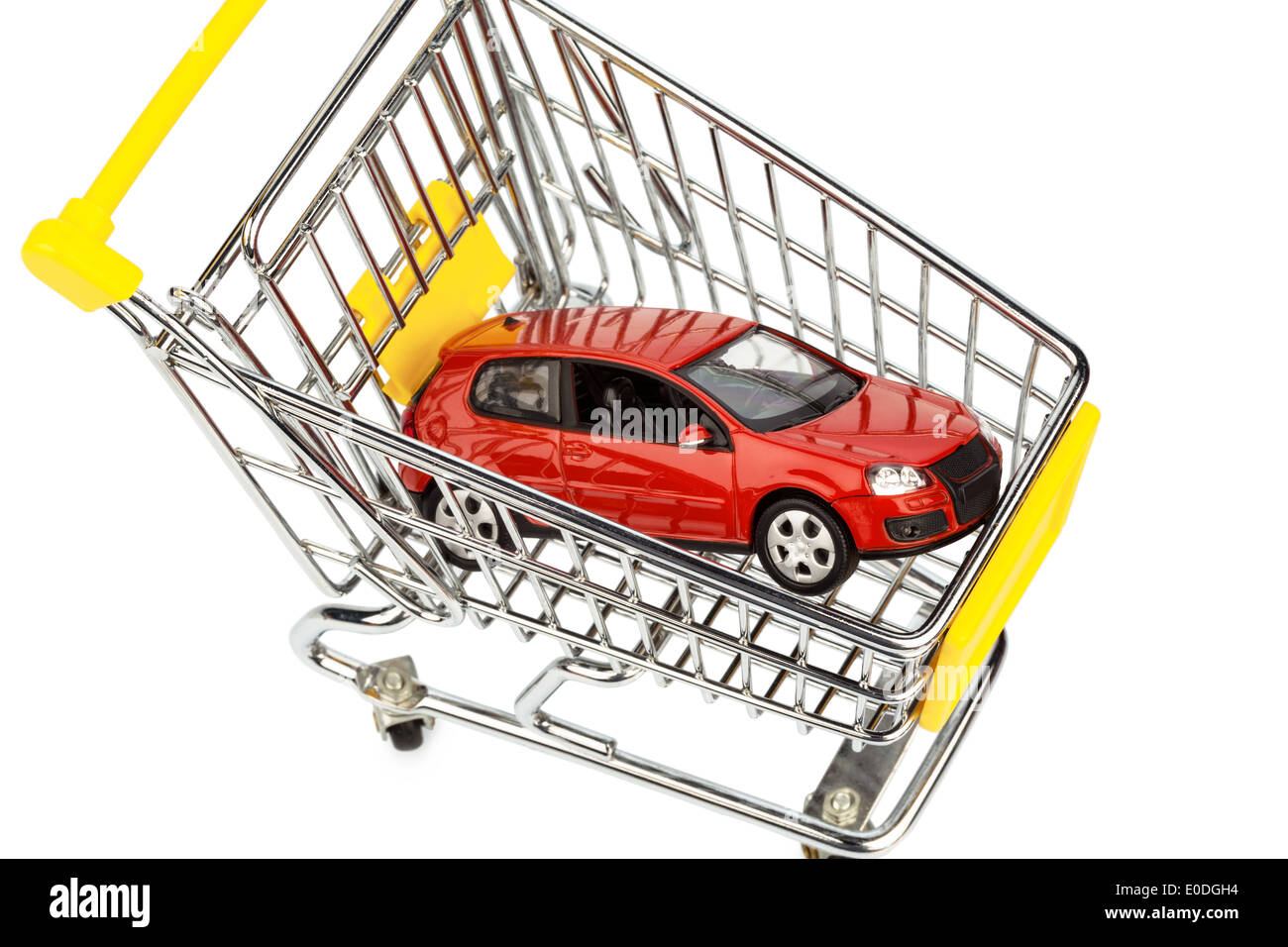 A car in the shopping cart as a symbol for autopurchase and leasing, Ein Auto im Einkaufswagen als Symbol fuer Autokauf und Leas Stock Photo