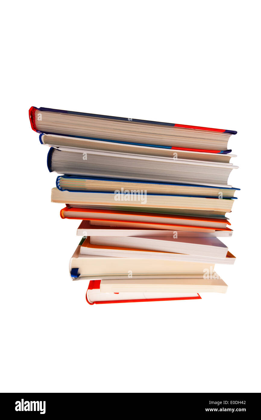 A pile of books lies on a white background, Ein Stapel von Buechern liegt auf einem weissen Hintergrund Stock Photo