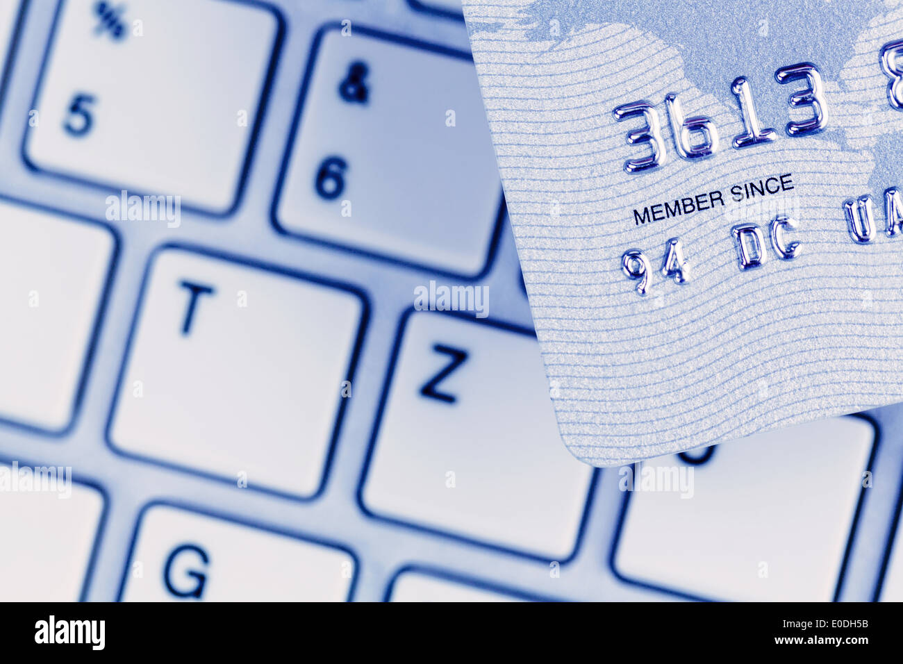 Close-up of a credit card pay for the cashless and keyboard. Symbolic photo for shopping on the Internet., Nahaufnahme einer Kre Stock Photo