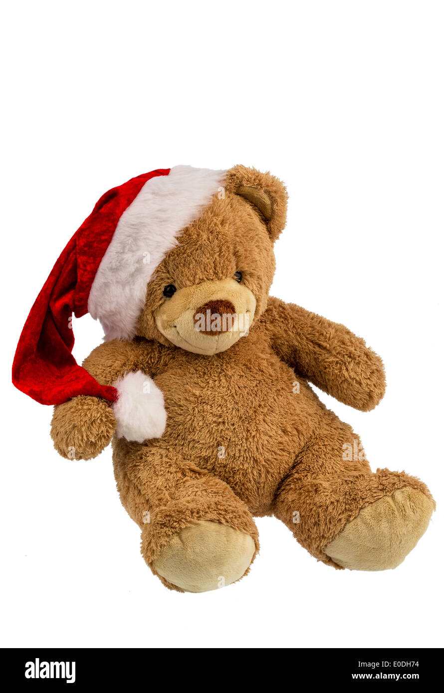 A teddy bear with presents at Christmas. When Santa Claus dresses up., Ein Teddybaer mit Geschenken zu Weihnachten. Als Weihnach Stock Photo