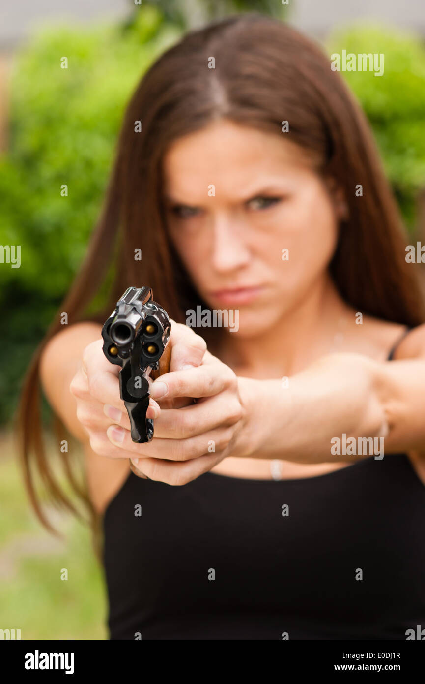 A 38 Police Special provides ample defense for this woman Stock Photo