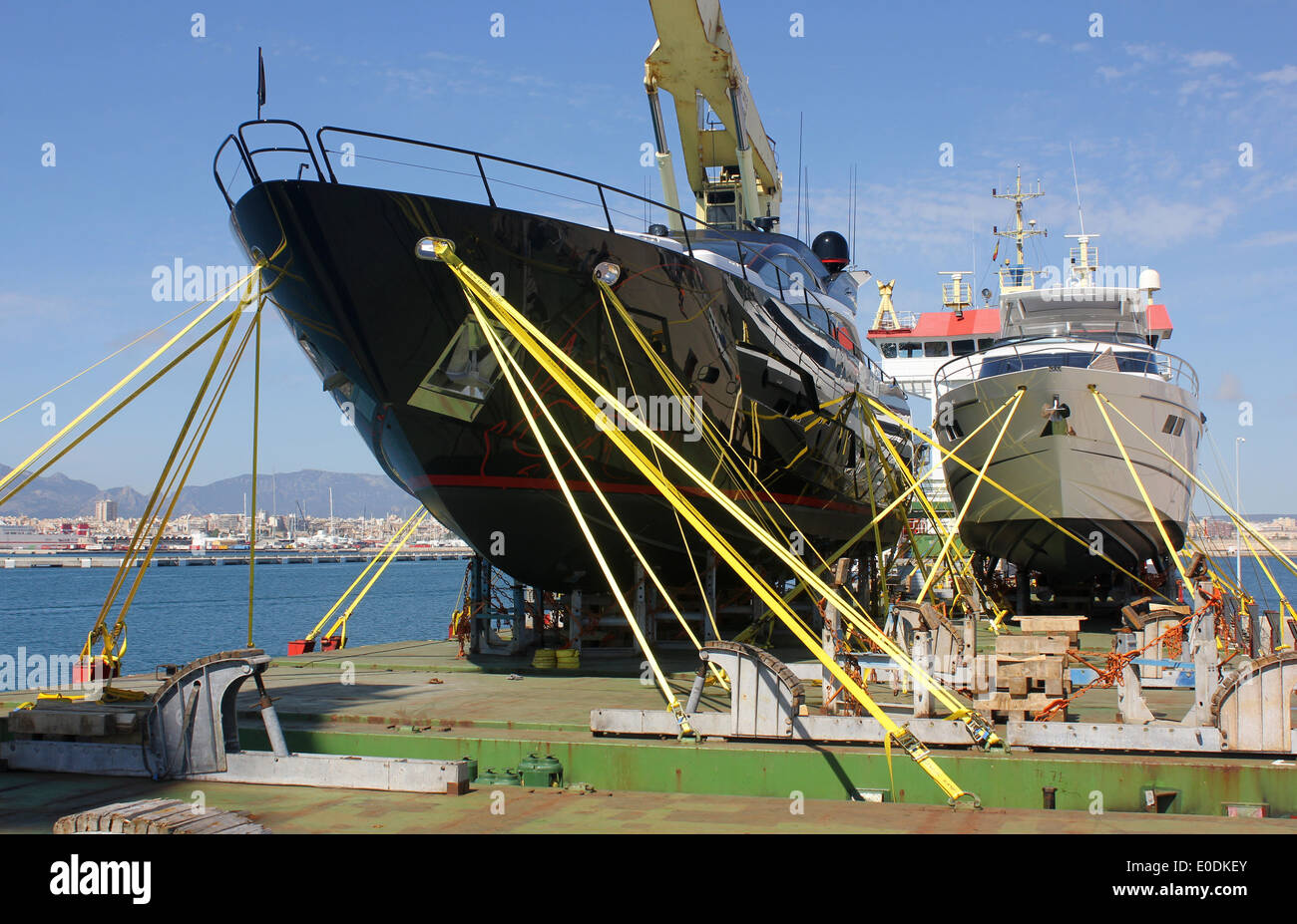 Luxury Motor Yachts - arriving in Palma de Mallorca on board MS Marmadura / Sevenstar Yacht Transport, Port of Palma de Mallorca Stock Photo