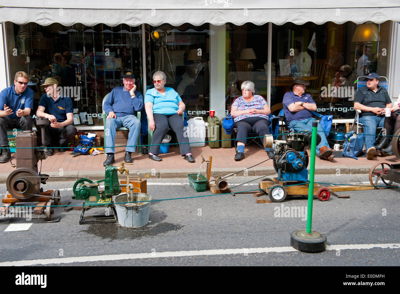 Stationary engine enthusiasts display their machines at a town fair Stock Photo