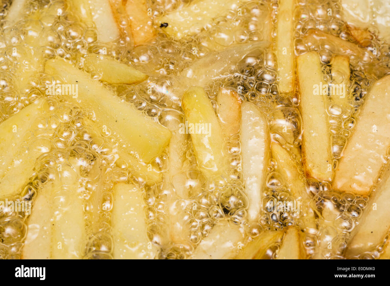 French Fries Boiling In Hot Oil Stock Photo Alamy