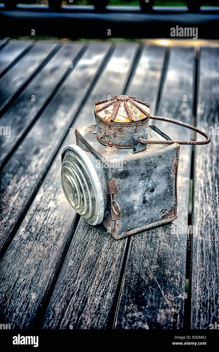 Vintage torch on old wood floor texture Stock Photo