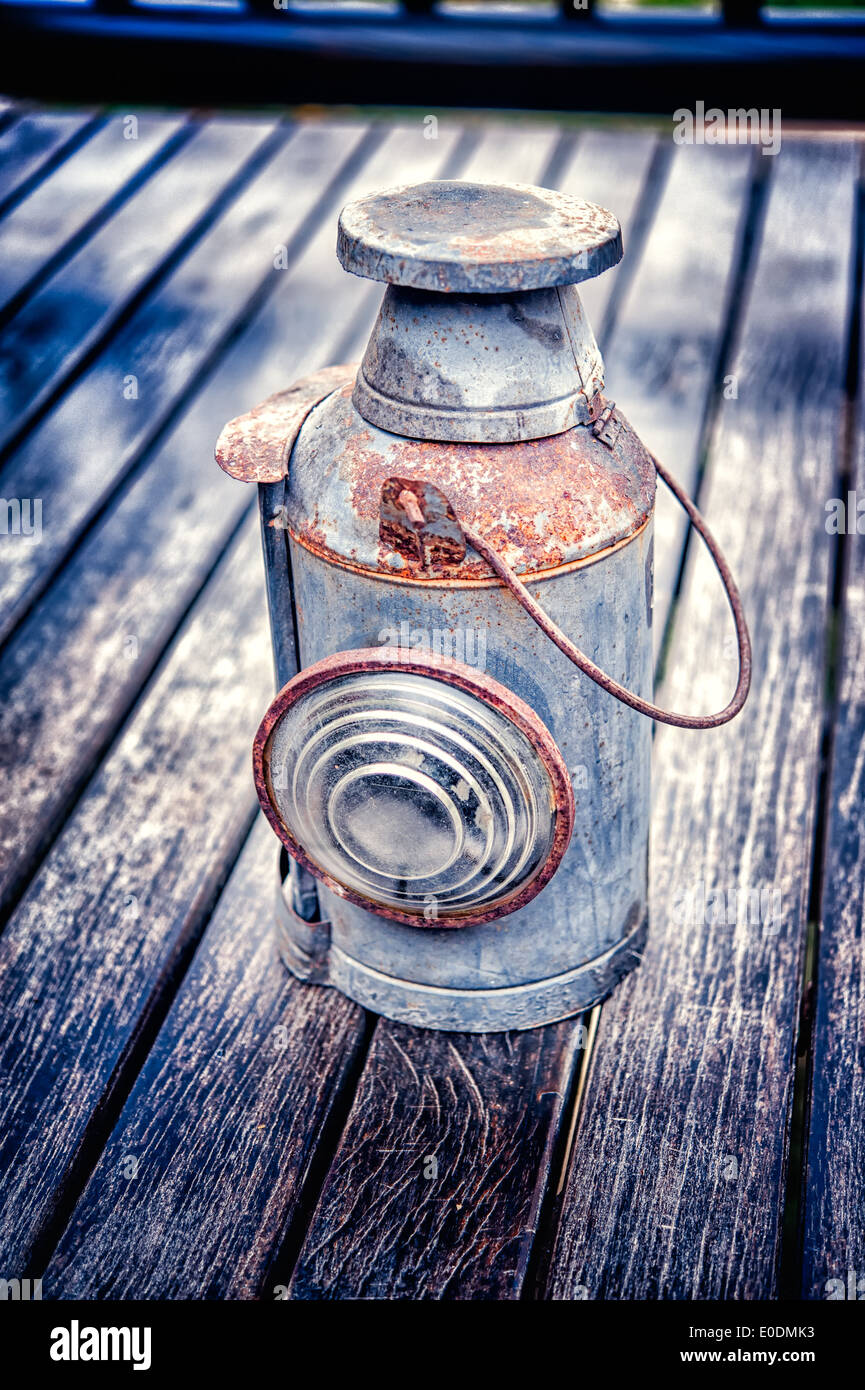 Vintage torch on old wood floor texture Stock Photo