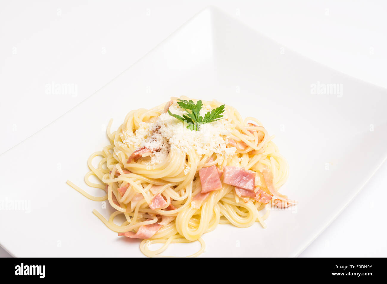 Spaghetti Carbonara Plate With Baked Ham And Parmesan Stock Photo Alamy