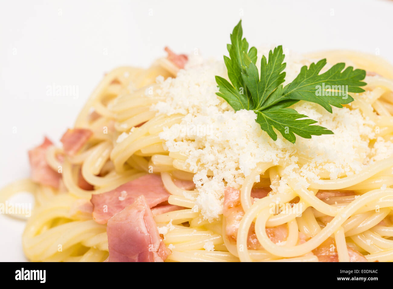 Spaghetti Carbonara With Baked Ham And Parmesan Close Up Stock Photo