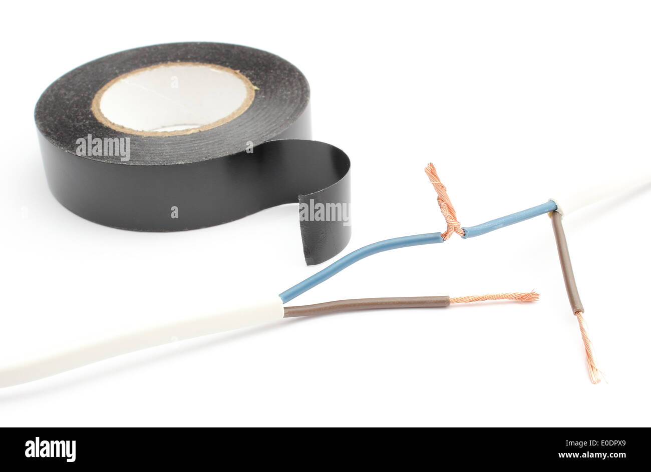 Closeup of connecting electrical cable, repair of electrical cable using insulating tape, tangled electrical cable Stock Photo