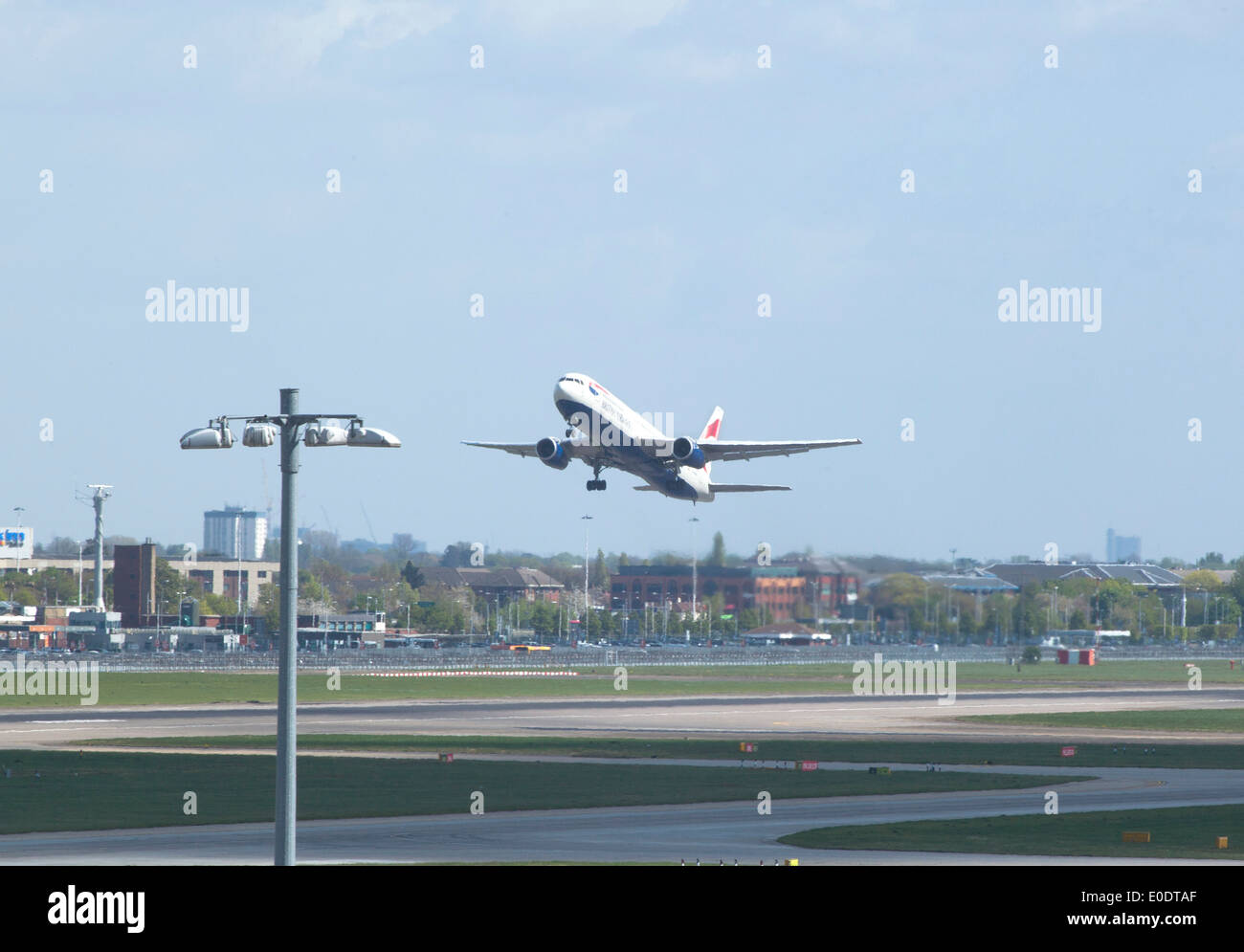 British Airways Boeing 757 takes off at Heathrow Airport runway Stock Photo