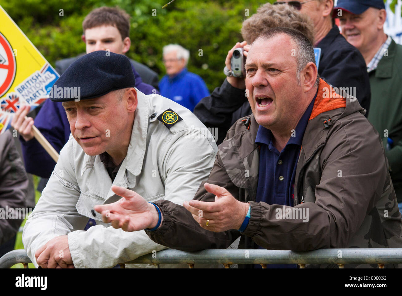 Hemel Hempstead, May 10th 2014. Members of the British National Party and other right wing organisations shout abuse at anti-Fascist counterprotesters who were penned about 70 metres from the BNP's position. Credit:  Paul Davey/Alamy Live News Stock Photo