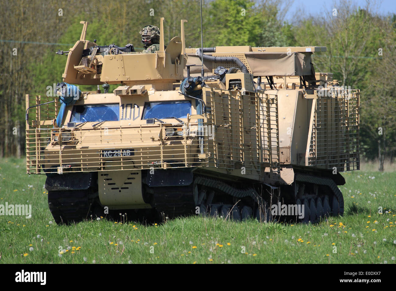 British Army Viking BVS10 protected all terrain vehicle fitted with slat armour. Stock Photo