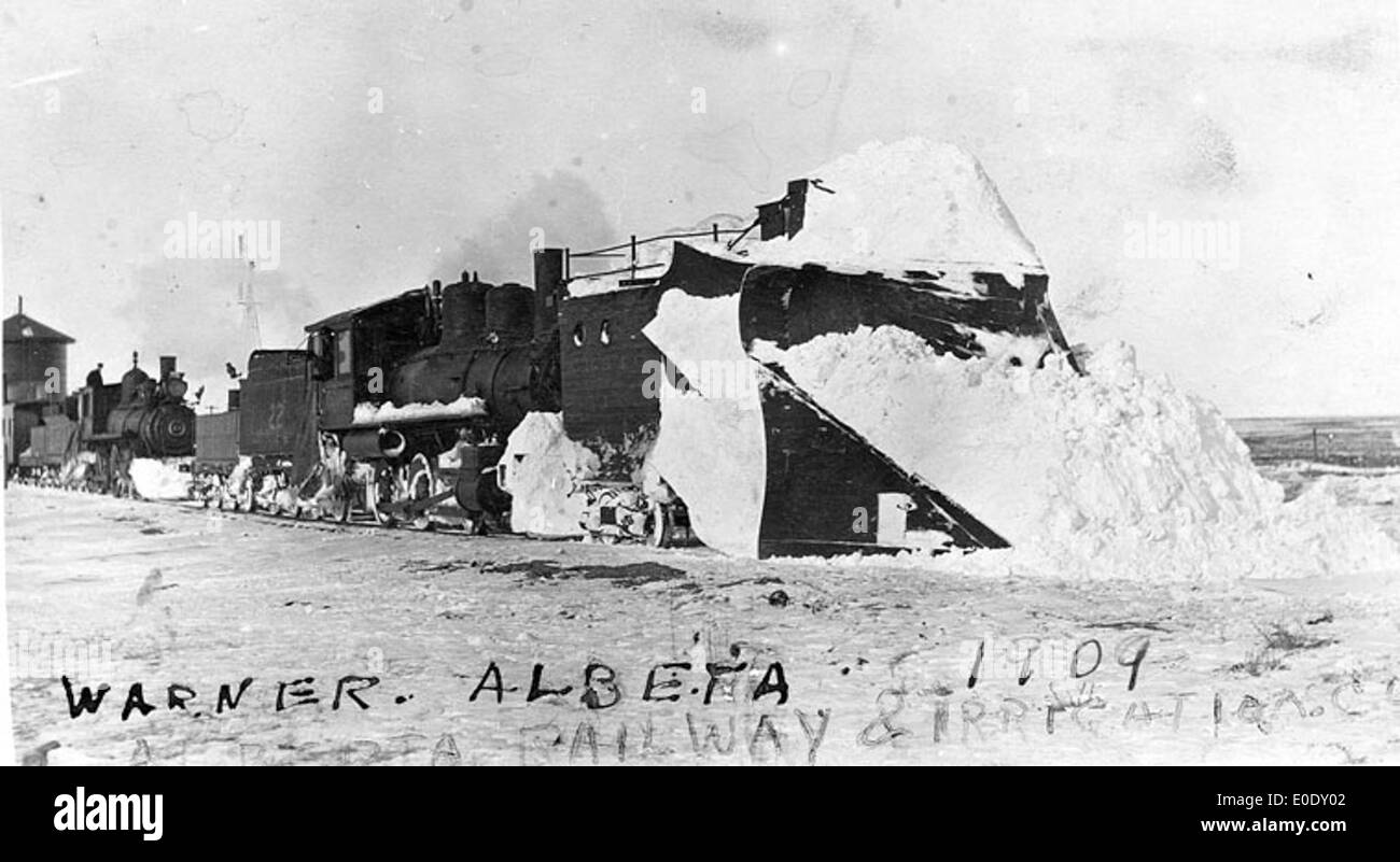 Snow Plow And Alberta Railway And Irrigation Company Engines 22 And 25 At Warne Stock Photo