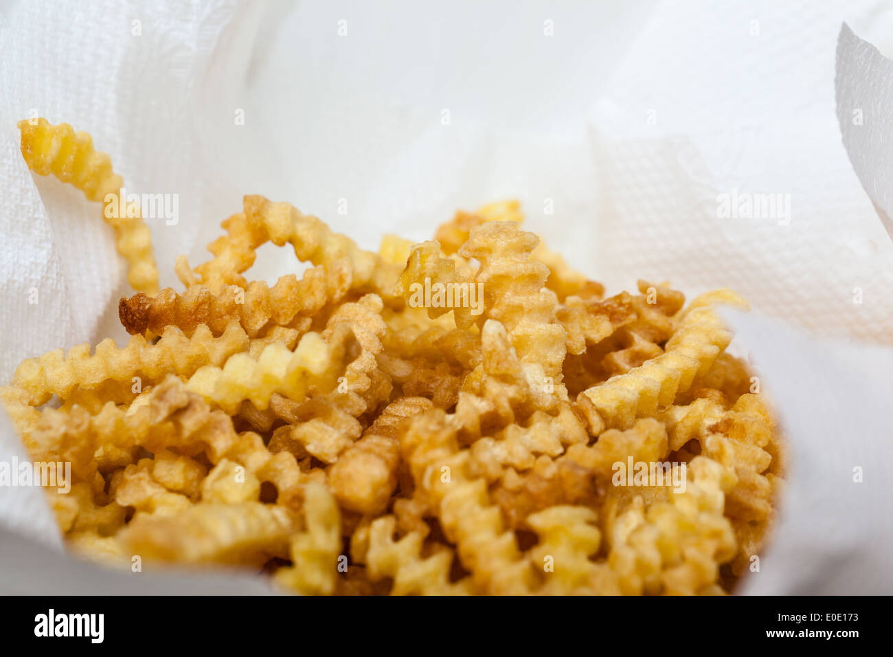 some golden and crispy french fries on absorbant paper Stock Photo Alamy