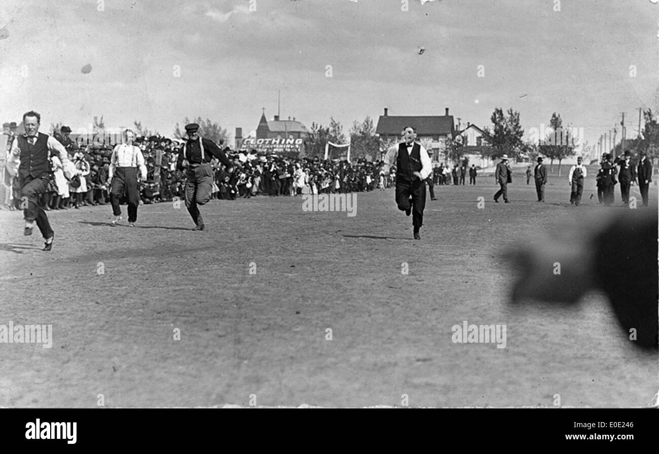 Competitors in a foot race in Galt Gardens Stock Photo