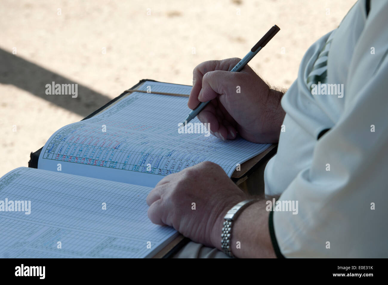 Village cricket scorer at Catherine de Barnes, West Midlands, England, UK Stock Photo