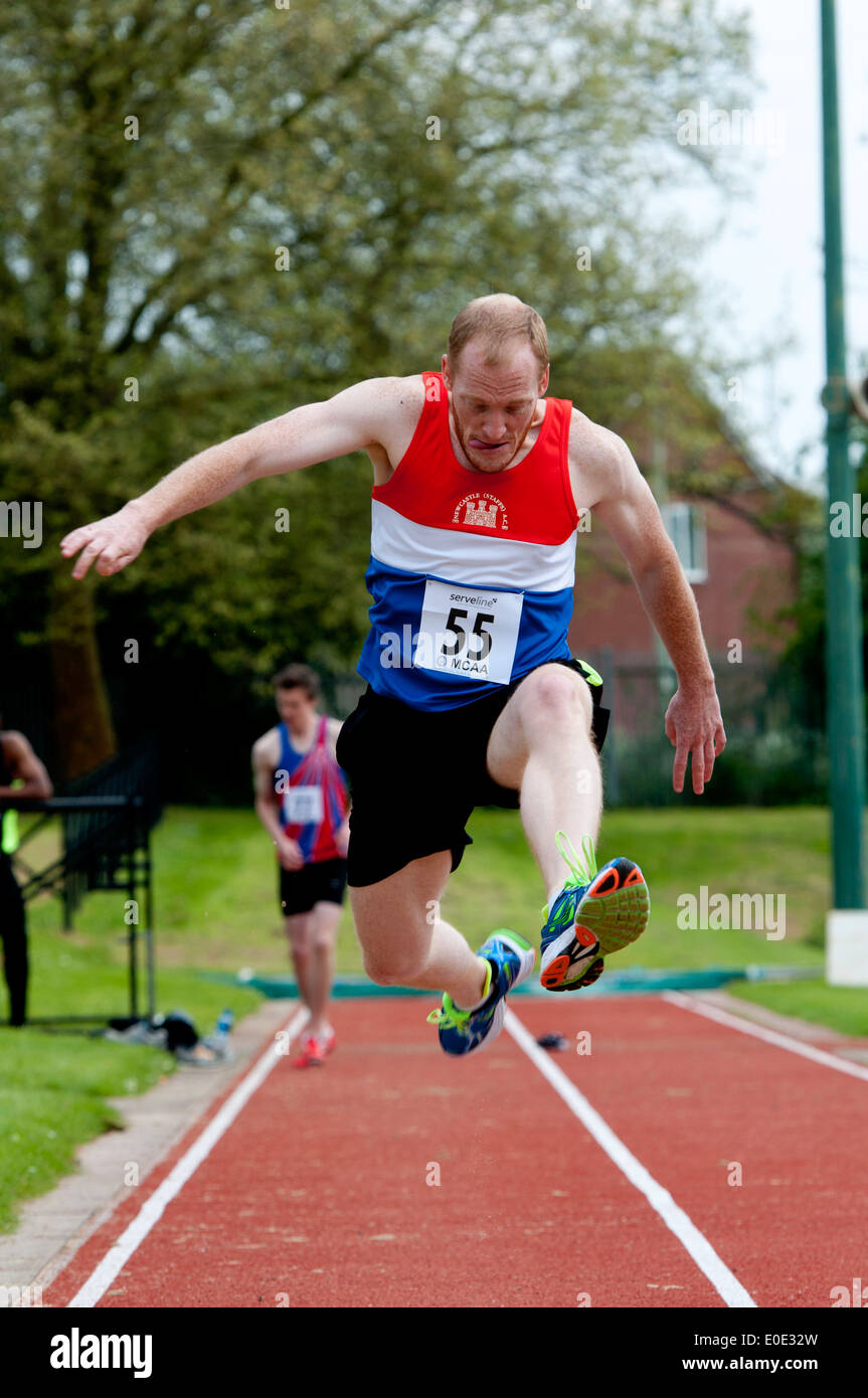 Athletics, competitor on men`s long jump at club level, UK Stock Photo ...