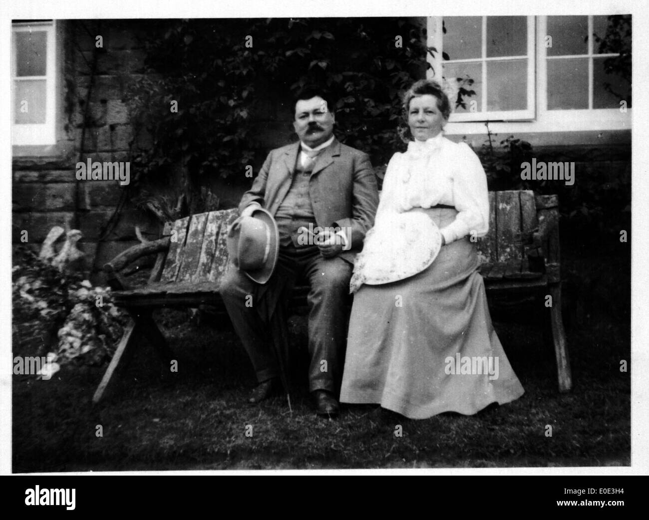Couple on old bench Stock Photo