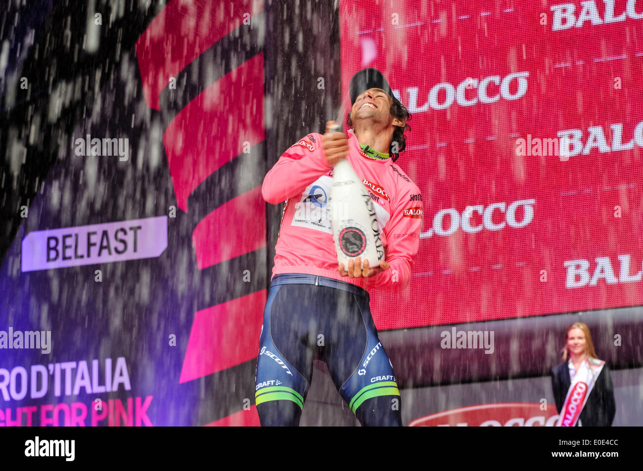 Belfast, Northern Ireland. 10 May 2014 - Australia’s Michael Matthews takes over the pink Maglia Rosa of the overall race leader in the Giro d'Italia, worn during the stage by his team-mate Svein Tuft. Credit:  Stephen Barnes/Alamy Live News Stock Photo