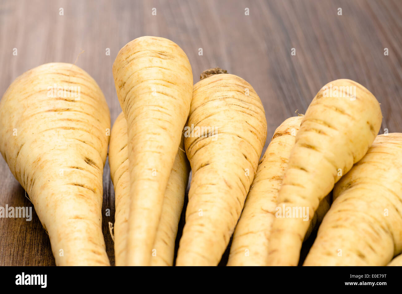 Raw root vegetable parsnips on a heap Stock Photo Alamy