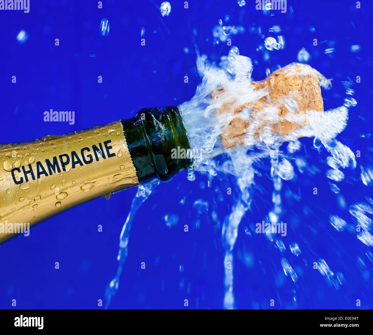A bottle of champagnes is opened. Symbolic photo for opening, celebrate