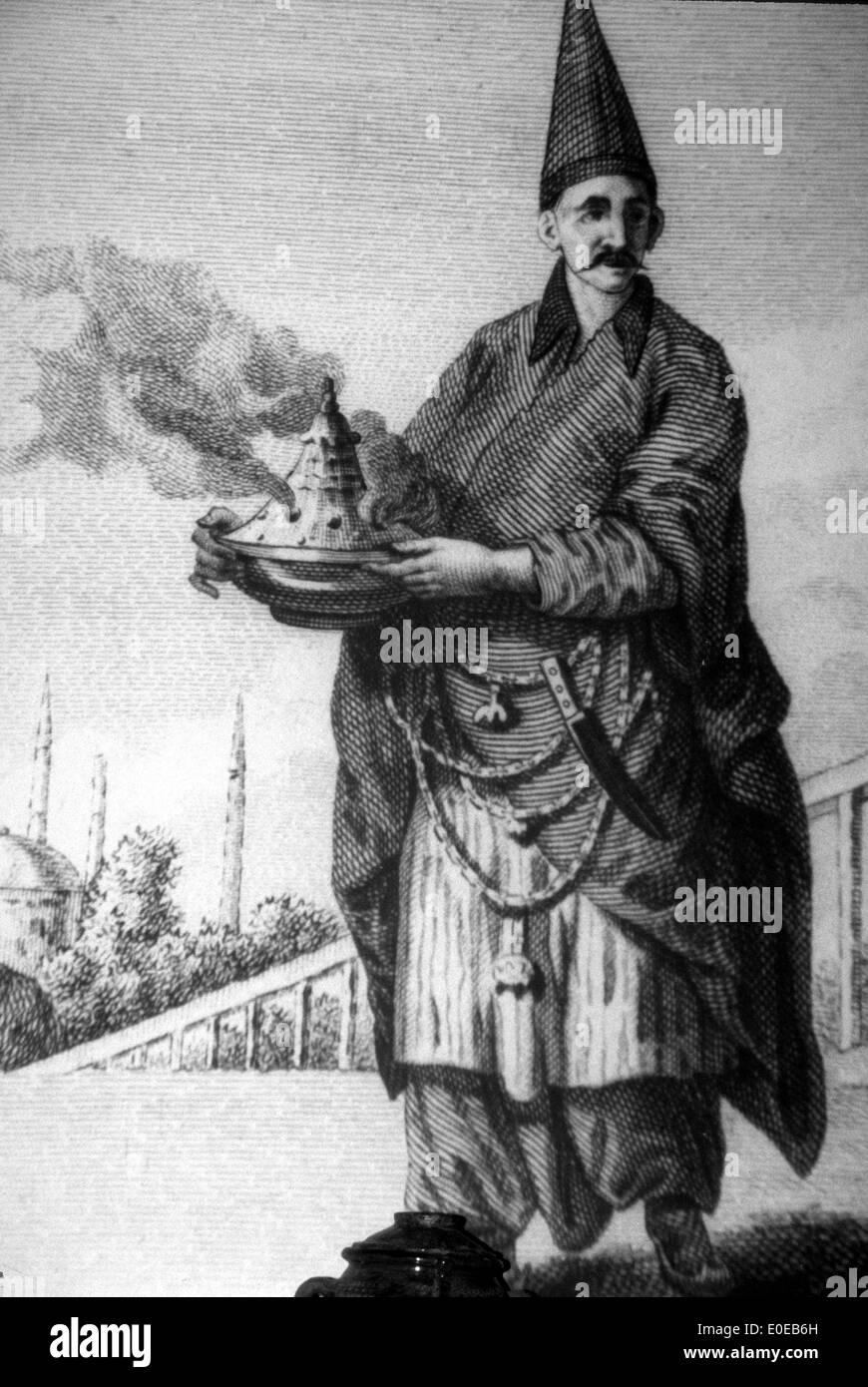 Ottoman chef with hot dish in the kitchen of the Topkapi Palace in Istanbul, Turkey Stock Photo