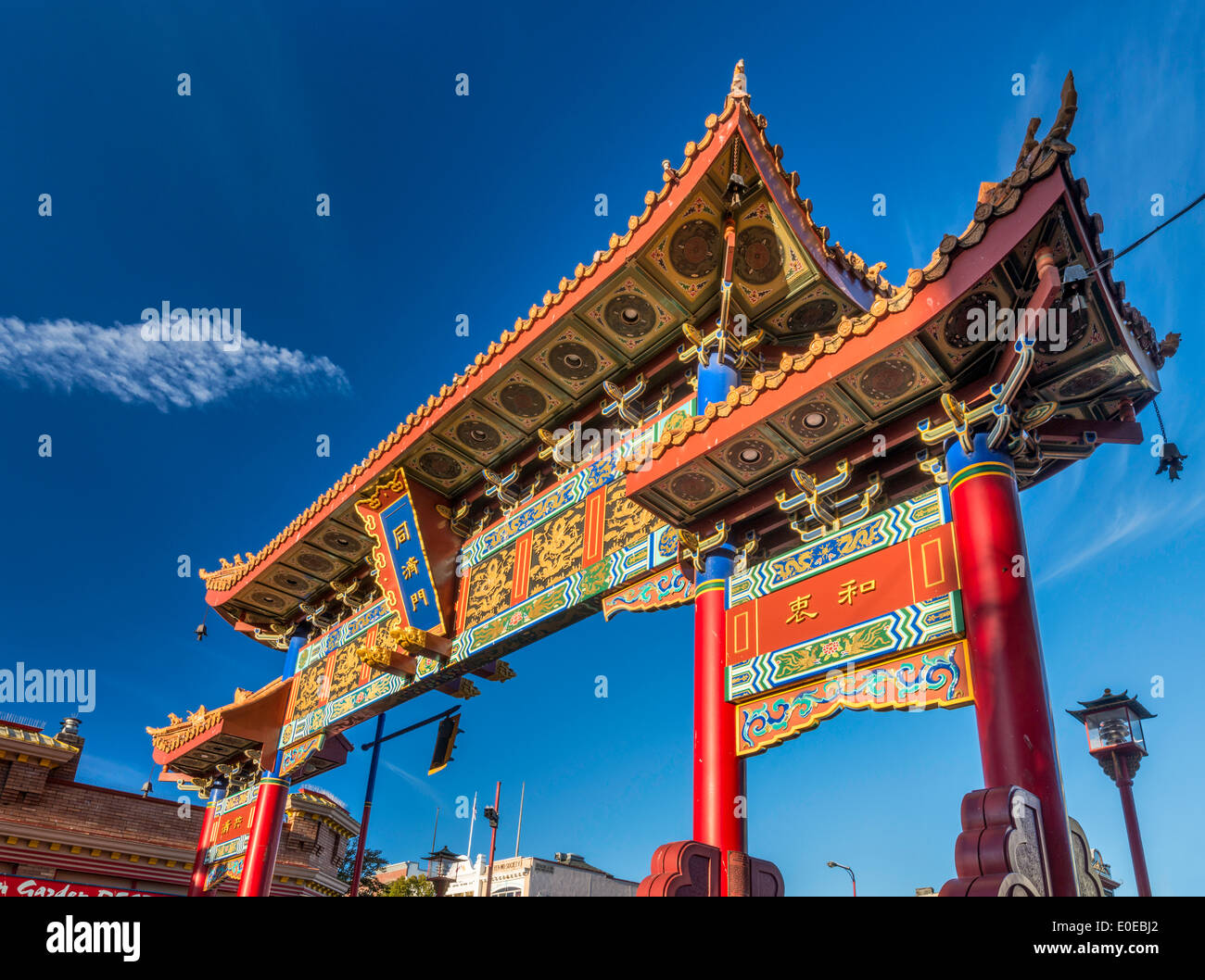 Gate of Harmonious Interest in Chinatown at sunset, Victoria, Vancouver Island, British Columbia, Canada Stock Photo