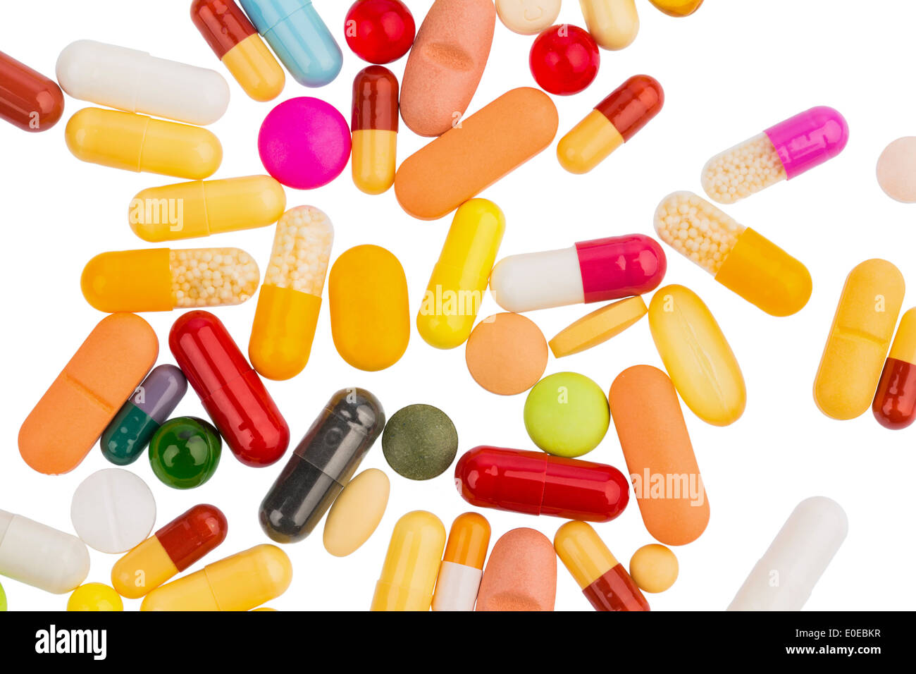 Many coloured tablets on white background. Symbolic photo for medicine and  drugs, Viele bunte Tabletten auf weissem Hintergrund Stock Photo - Alamy