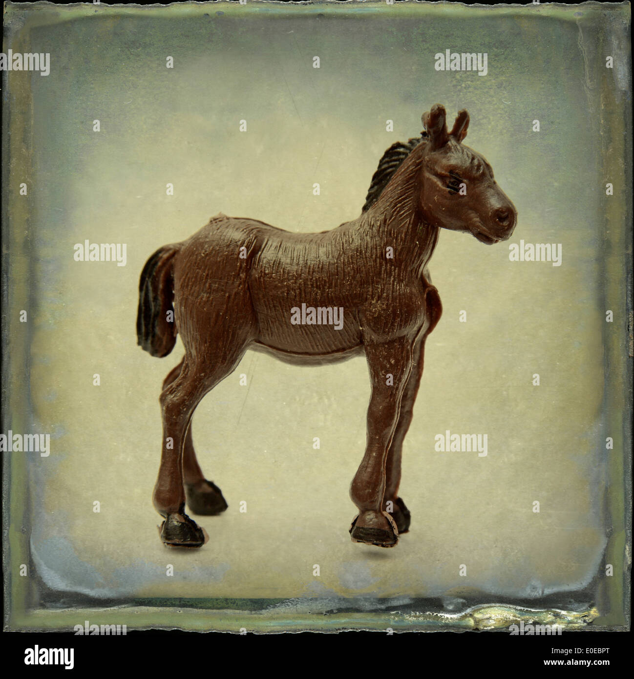 Old-fashioned plastic horse figurine - art-effect image Stock Photo