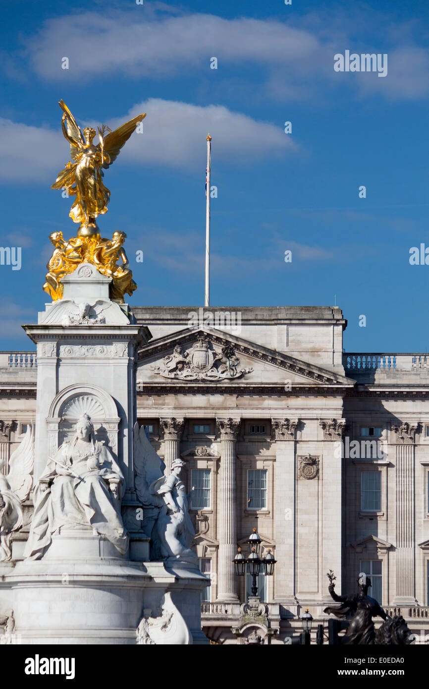 Buckingham Palace with Victoria Memorial statues in foreground London England UK Stock Photo