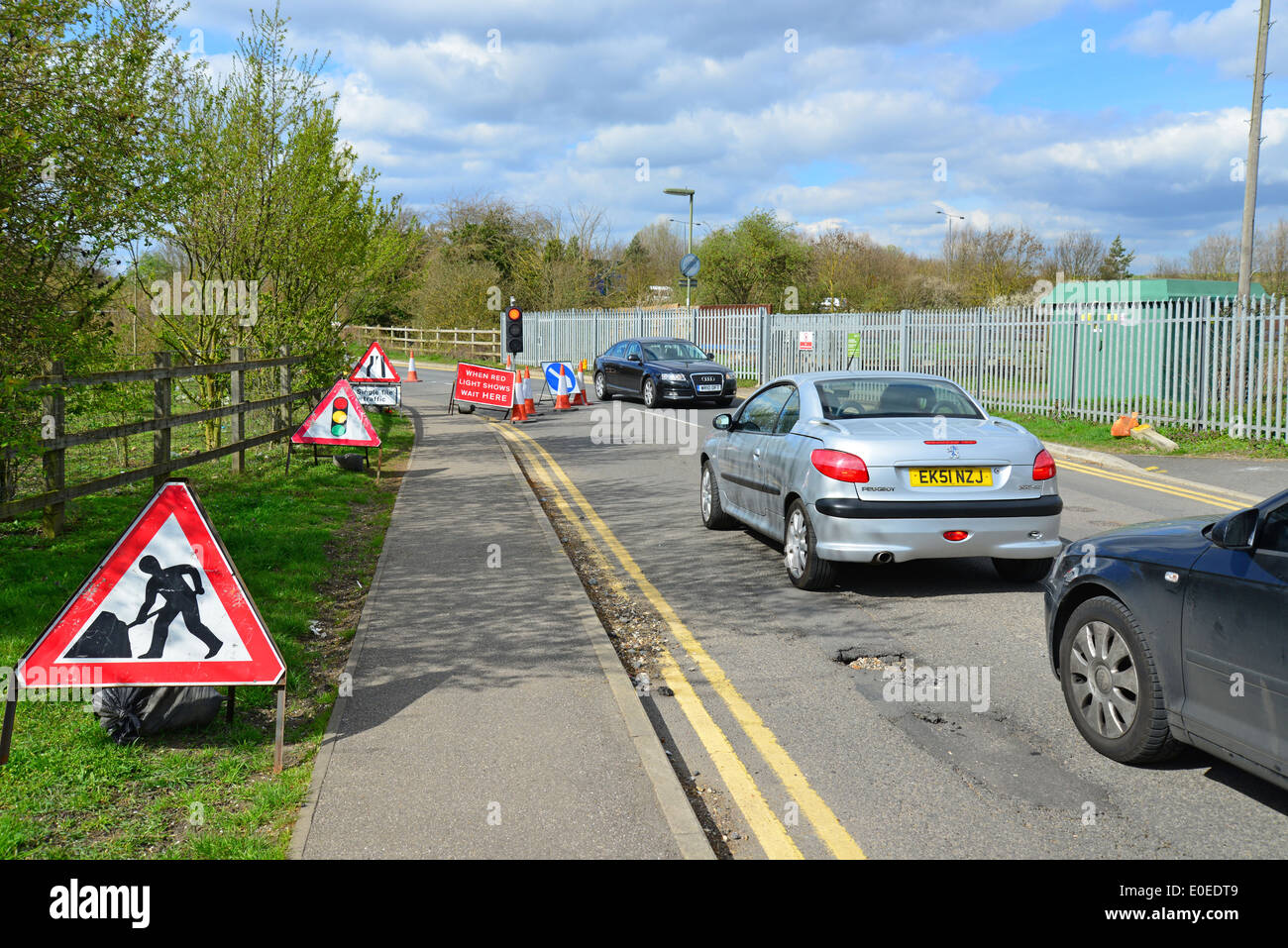 Traffic lights at roadworks, Stanwell Moor, Surrey, England, United