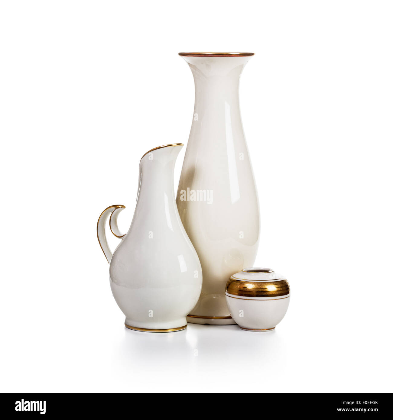 Three antique white porcelain vases on white background clipping path