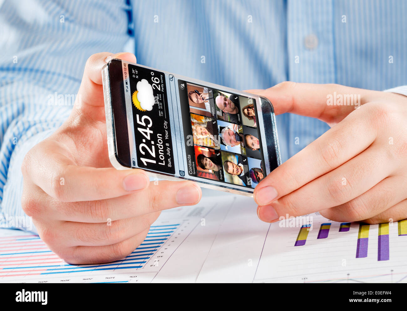 Smartphone with transparent screen in human hands. Stock Photo