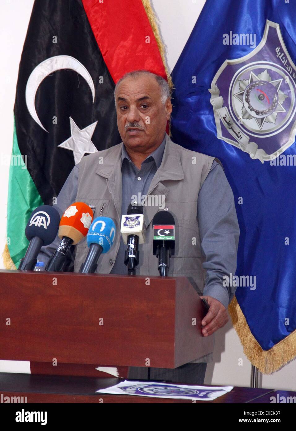 Tripoli, Libya. 11th May, 2014. Libyan Interior Minister-designate Saleh Maziq addresses a press conference in Tripoli, Libya, on May 11, 2014. Saleh Maziq stressed that the INTERPOL had expressed its readiness to help Libya recover stolen assets by former Gaddafi's regime during his visit to INTERPOL recently. Credit:  Hamza Turkia/Xinhua/Alamy Live News Stock Photo