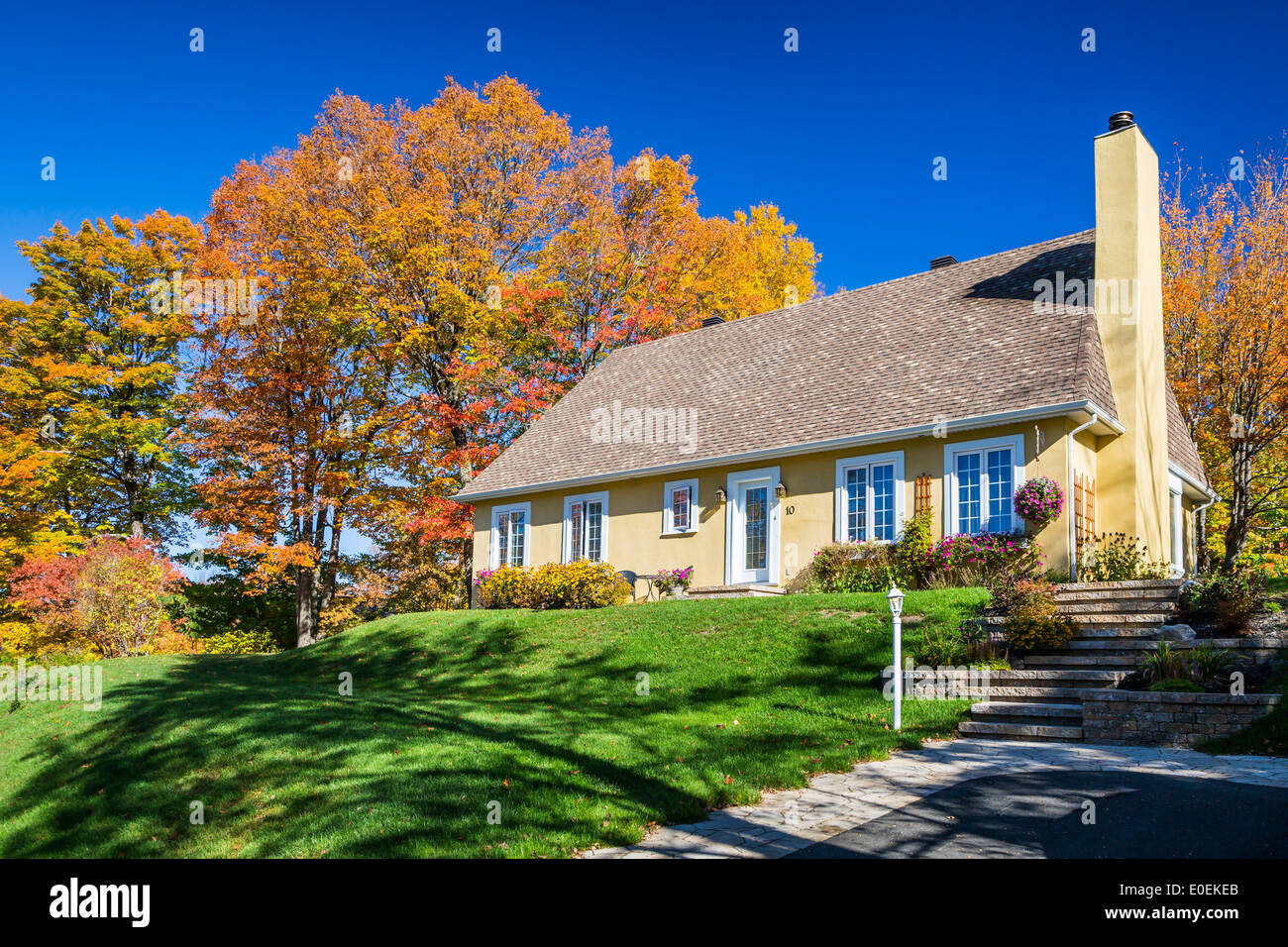 A home with fall foliage color near Saint Brigette de Laval, Quebec ...