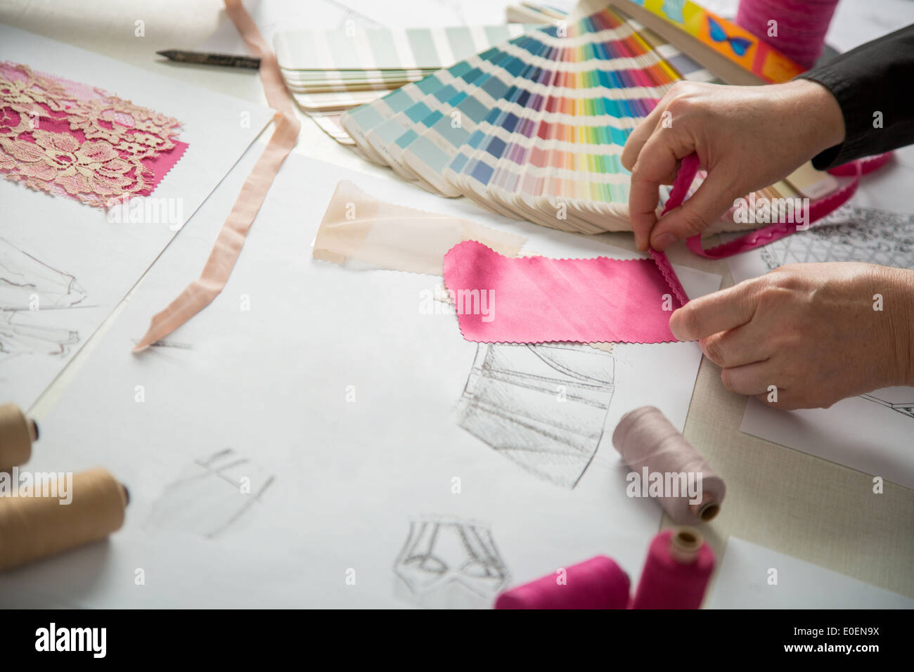 fashion designers, working in progress on tailor table Stock Photo