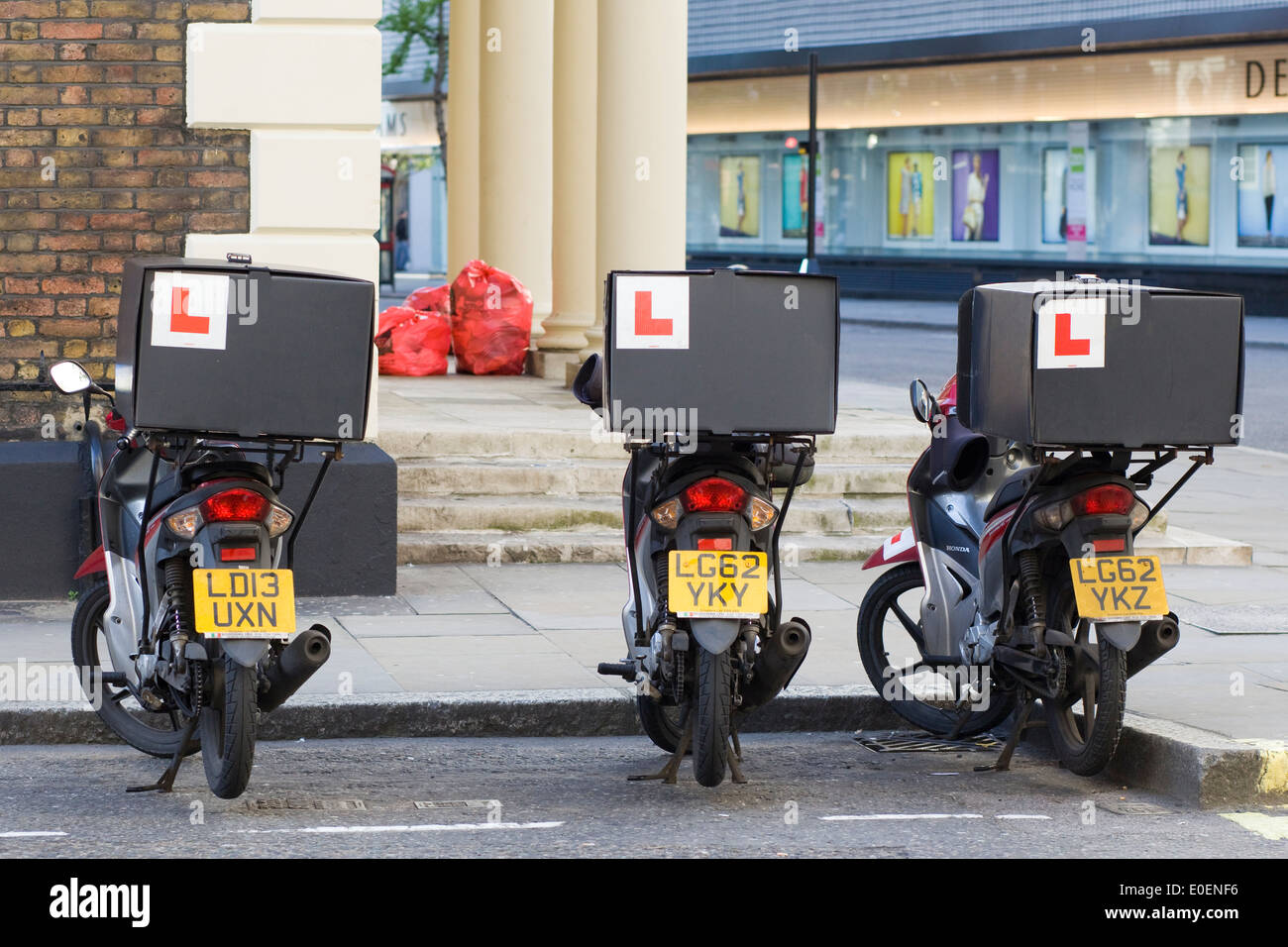Three Learner Motorcycle parked in a row Stock Photo
