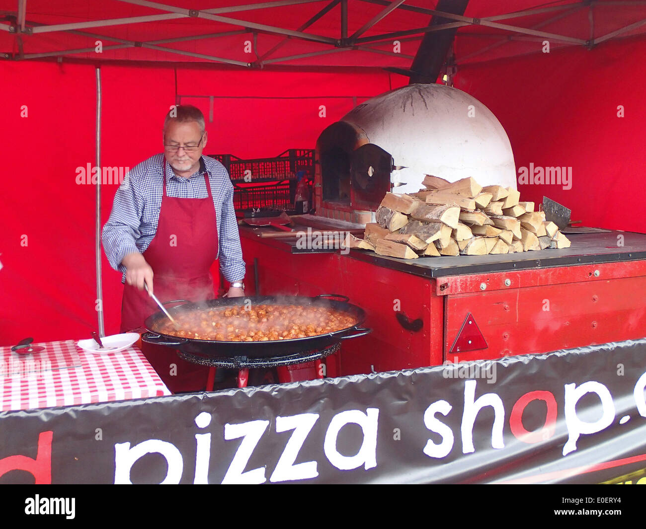 Chorley, Lancashire, UK. 11th May, 2014. Cooking Pizza at the first ever food festival to be held in Chorley. Credit:  Sue Burton/Alamy Live News Stock Photo