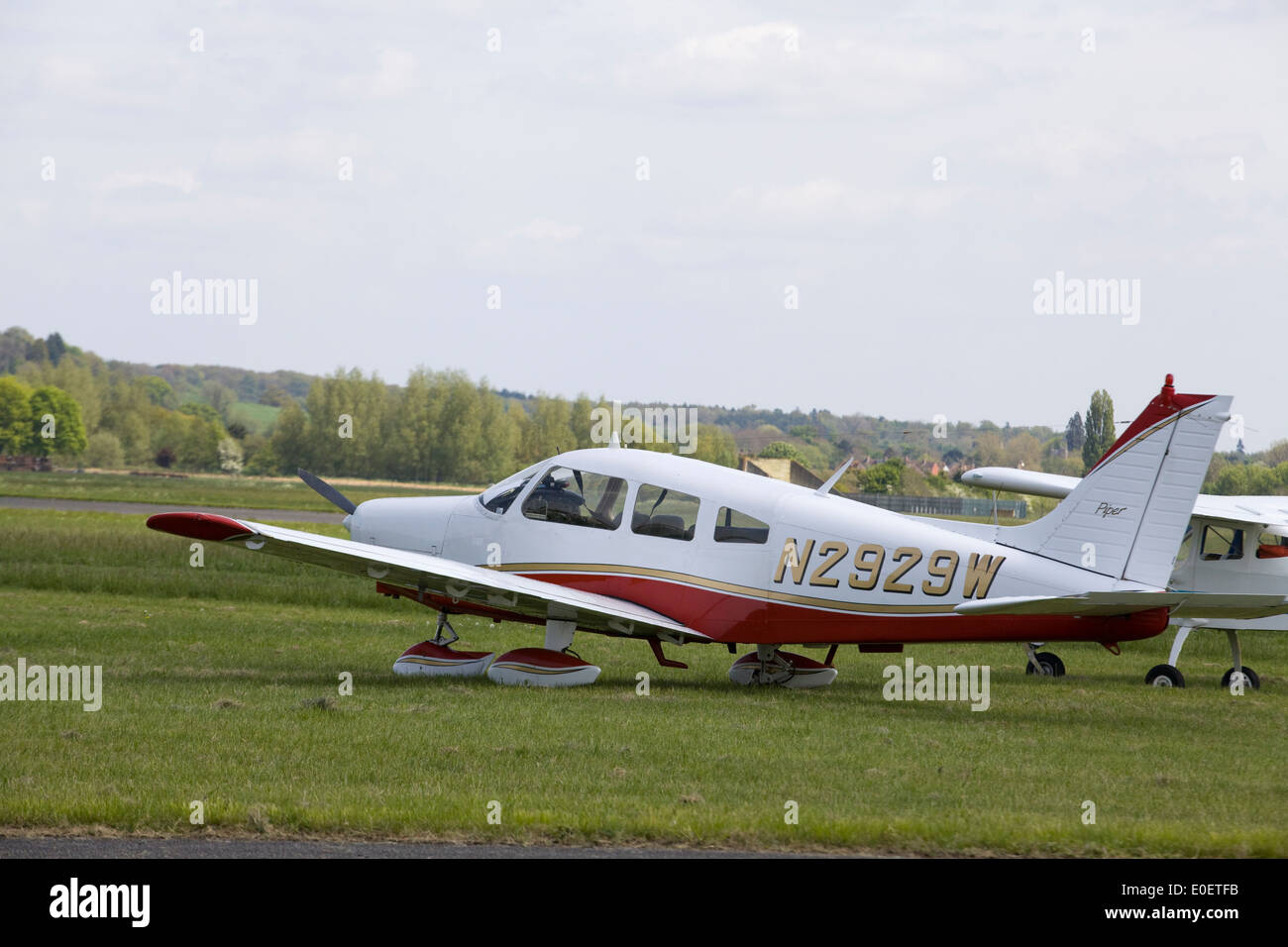 Piper Fixed Wing Single-Engine Plane parked in field Stock Photo - Alamy
