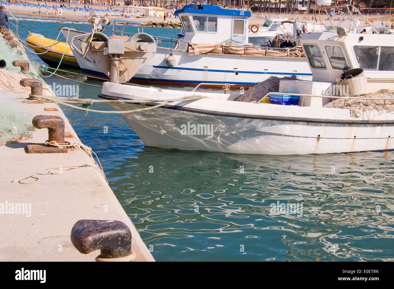 Fishing boats moored in the port Stock Photo - Alamy