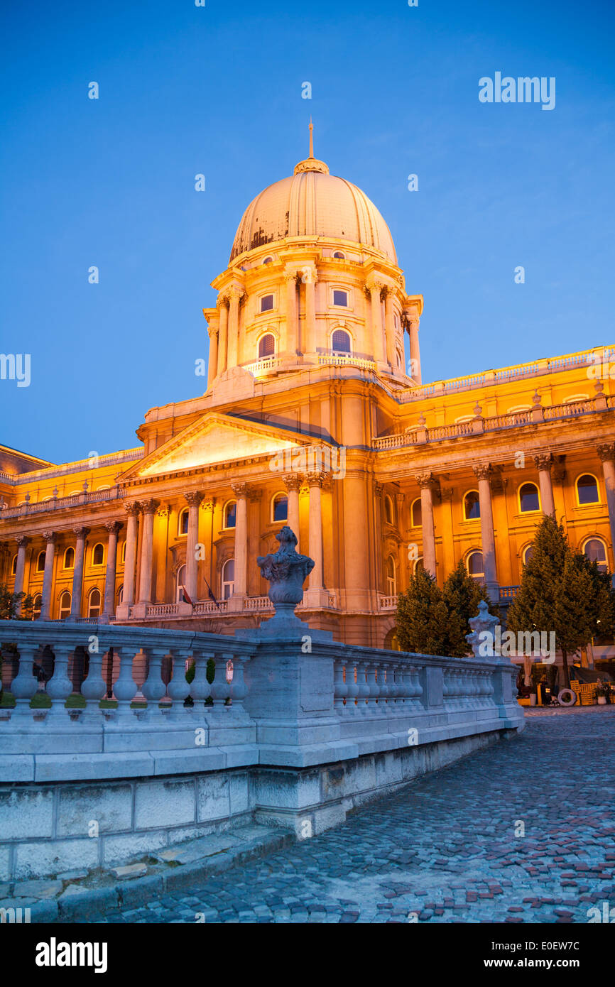 Buda Castle in golden lights at night Budapest Stock Photo