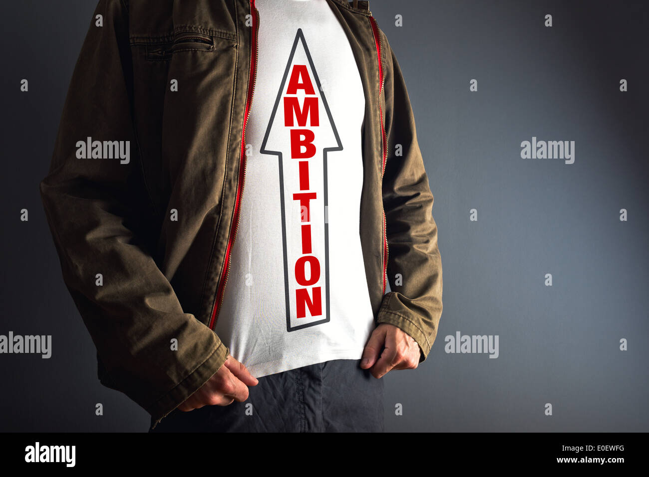 Man wearing white shirt with title ambition. Aspiration and initiative concept. Stock Photo