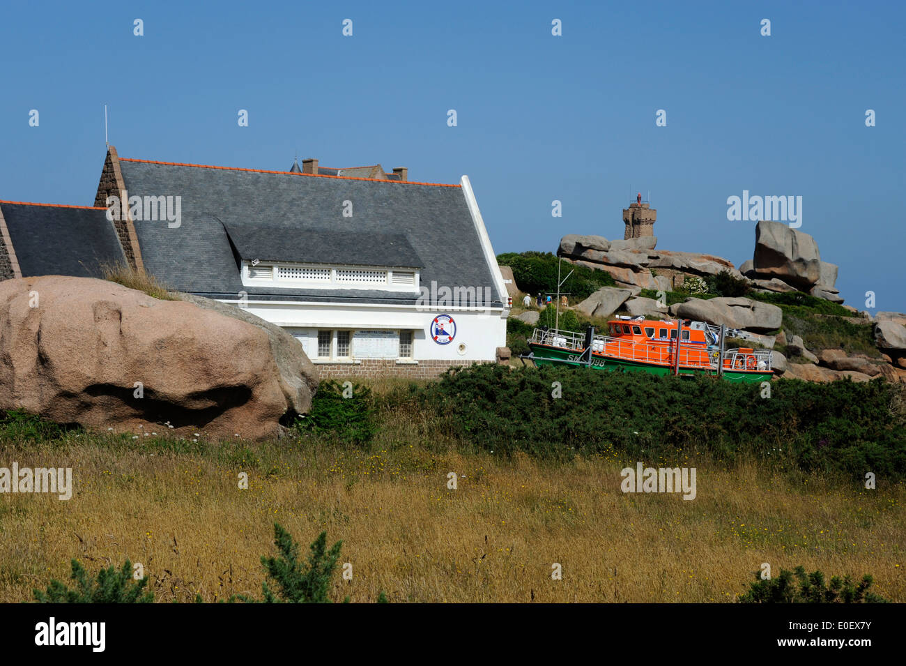 Pink granite coast,Ploumanac'h, lighthouse;phare de Mean Ruz,SNS 098,lifeboat,Cotes-d'Armor,Tregor,Bretagne,Brittany,France Stock Photo
