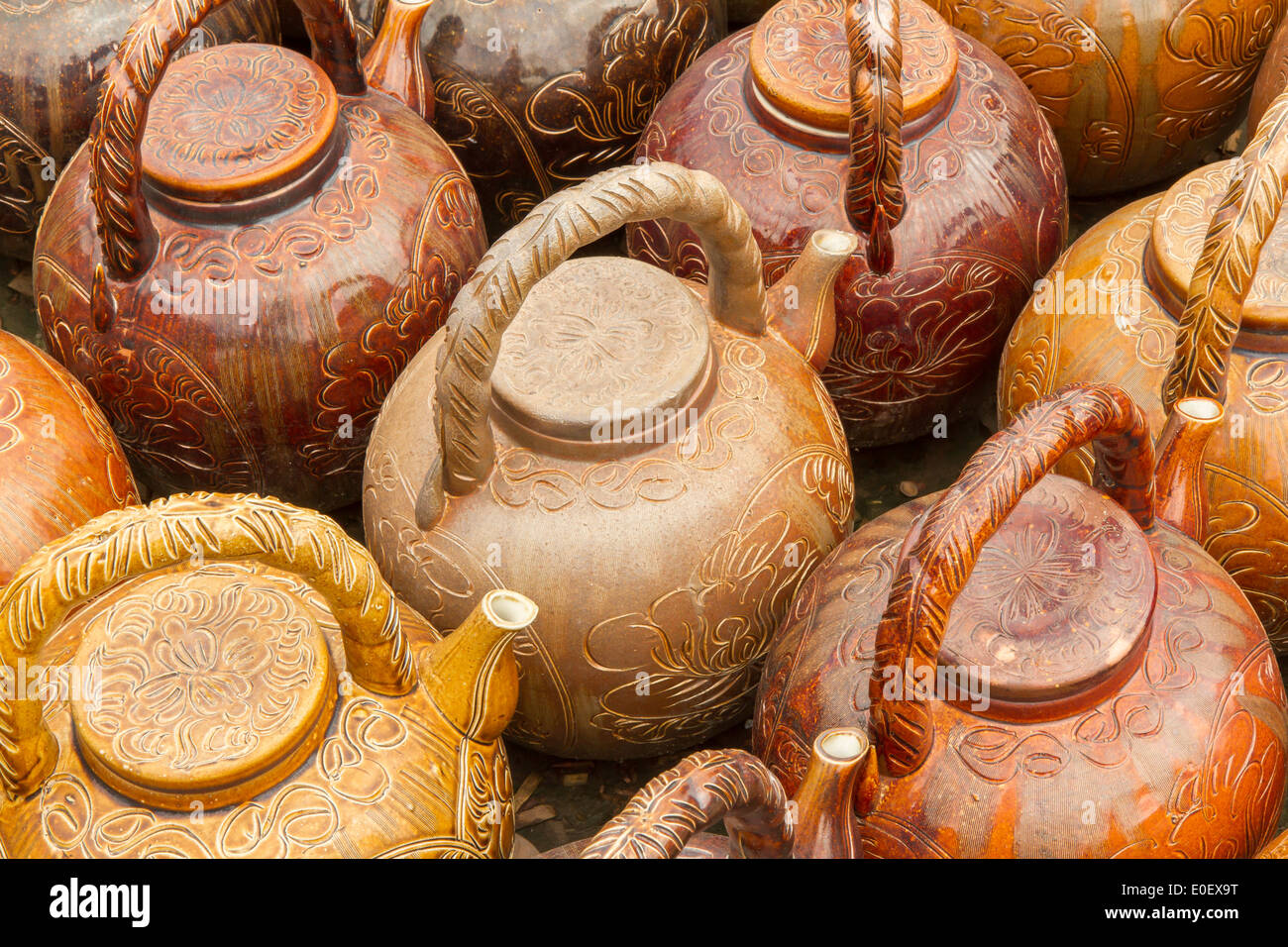 Many teapots waiting to be sold at a factory in Vietnam Stock Photo Alamy